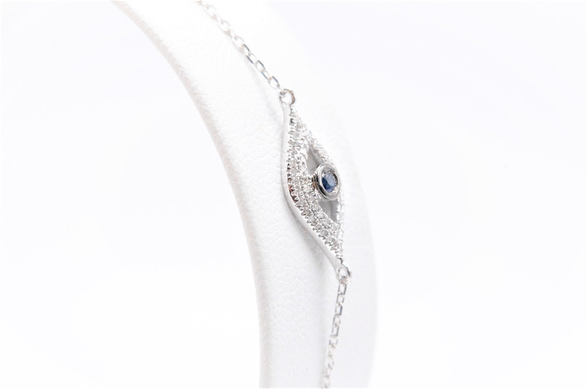 0.15 CTTW Diamond and Sapphire Evil Eye Bracelet in 14K White Gold, Adjustable 7.5" Specialty Bracelets